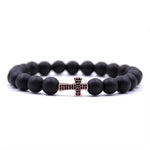 Pulseira moderna cruz ouro rosa e preto