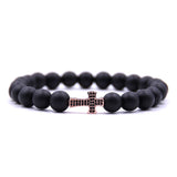Pulseira moderna cruz ouro rosa e preto
