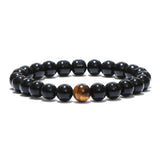 Pulseira olho de tigre e obsidiana 1 pérola de tigre