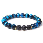 Pulseira olho de tigre e pedra vulcânica olho de tigre azul / 17 cm