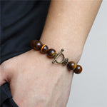 Pulseira pérolas grandes olho de tigre