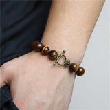 Pulseira pérolas grandes olho de tigre