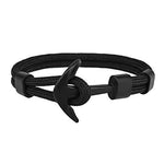 Pulseira preta com âncora valor por defeito título