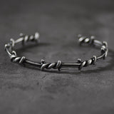 Pulseira rígida arame farpado valor por defeito título