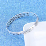 Pulseira rígida budista prata
