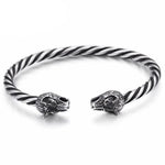 Pulseira rígida cabeça de lobo prata torcida