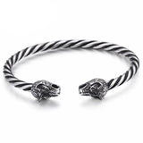 Pulseira rígida cabeça de lobo prata torcida