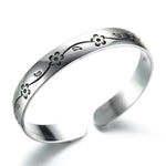 Pulseira rígida com motivos florais prata