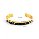 Pulseira rígida desportiva ouro e preto / 62 mm