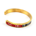 Pulseira rígida desportiva ouro e preto / 62 mm