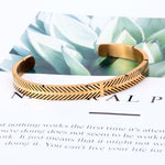 Pulseira rígida metálica