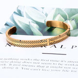 Pulseira rígida metálica
