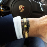 Pulseira rígida metálica