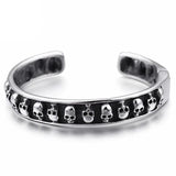 Pulseira rígida ossos e caveira prata